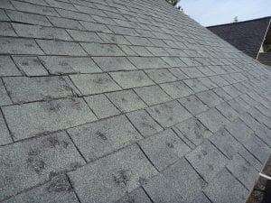 Hail damage on a San Antonio roof that needs to be repaired