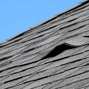 Picture showing roof damage from wind